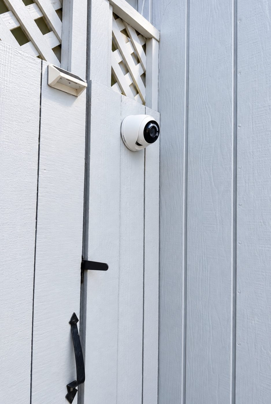 Lorex dome camera watching the side gate entry