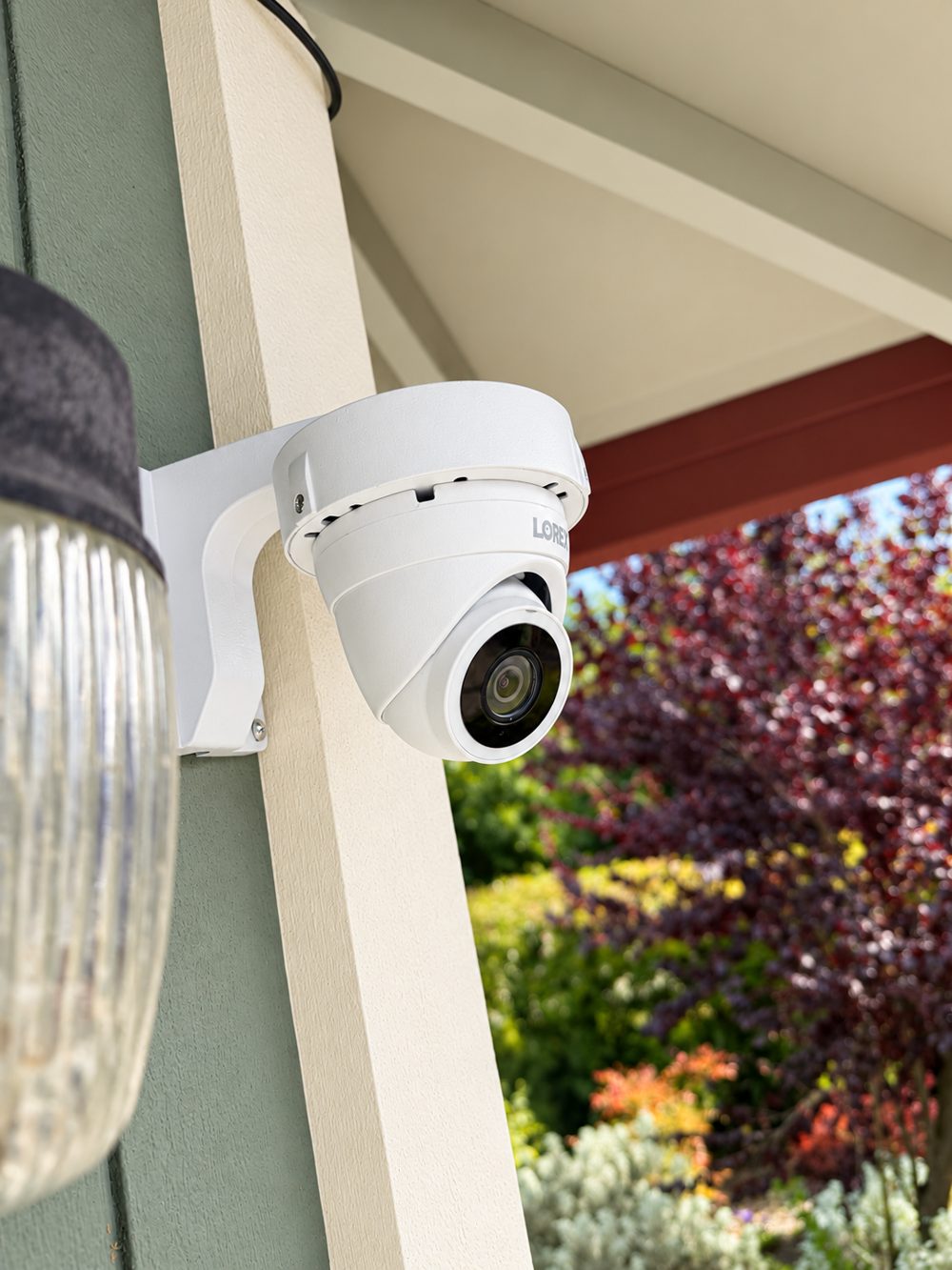 Lorex dome camera on a mounting arm for full porch coverage