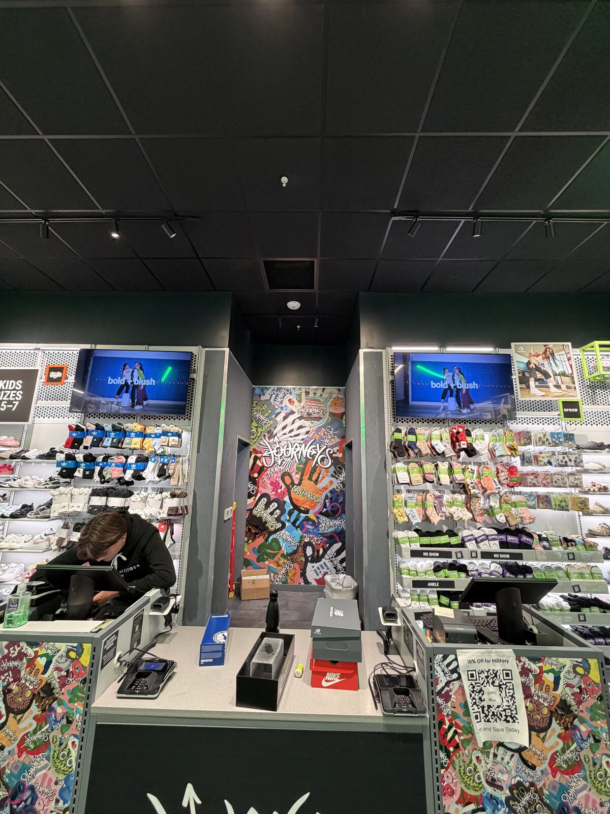 Full commercial install: splitter, 50 ft fiber HDMI run, and mounted displays