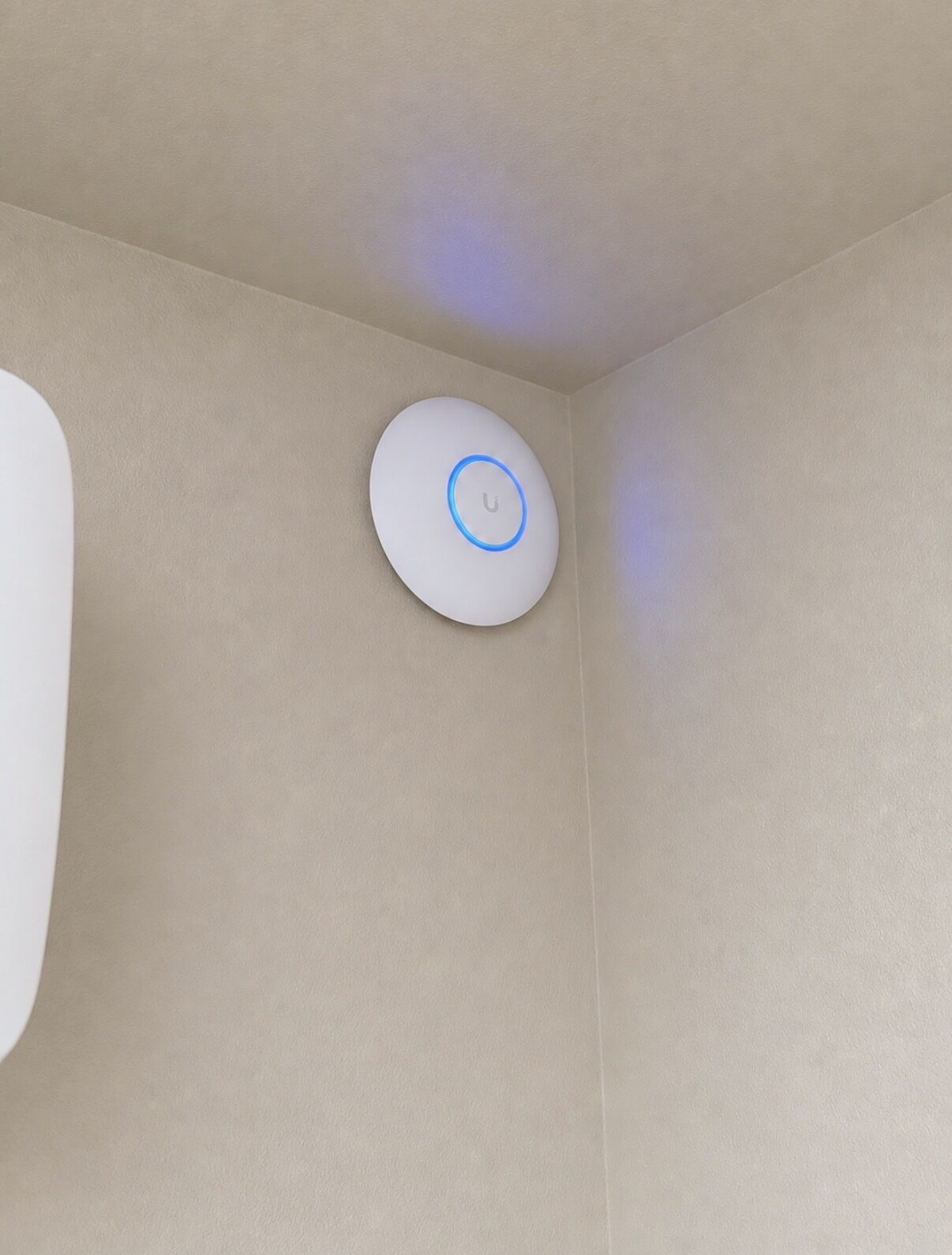 Interior UniFi access point placed for full coverage